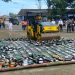 Ribuan botol miras berbagai merek dan knalpot brong dimusnahkan di Terminal Tipe A Kota Sukabumi, pada Kamis (20/3/2025). Foto: Istimewa.